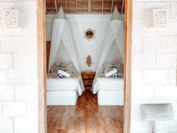 Imagen de la habitación del Hotel Uluwatu Breeze Village. Foto 20