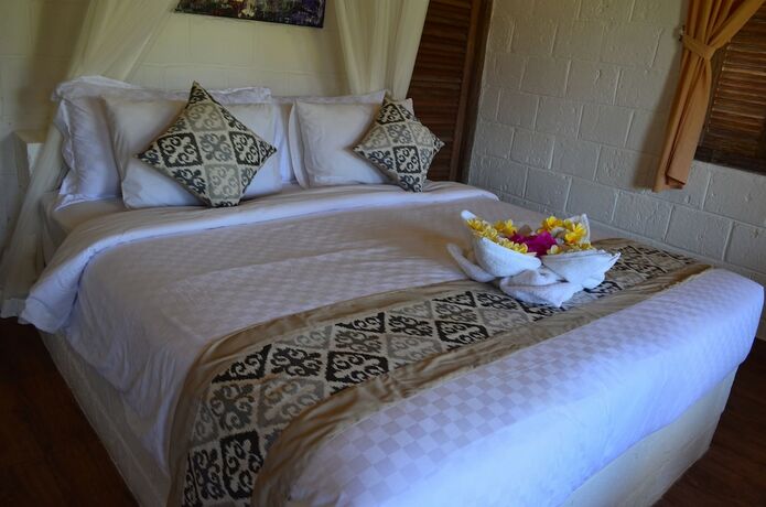 Imagen de la habitación del Hotel Uluwatu Breeze Village. Foto 23