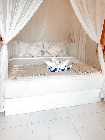 Imagen de la habitación del Hotel Uluwatu Breeze Village. Foto 24