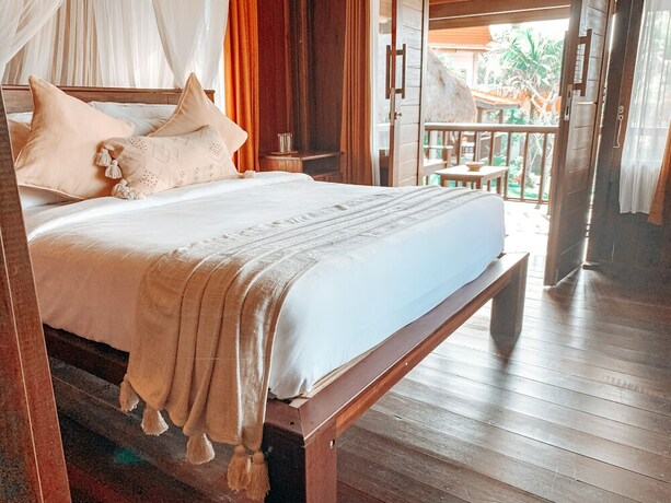 Imagen de la habitación del Hotel Uluwatu Breeze Village. Foto 25