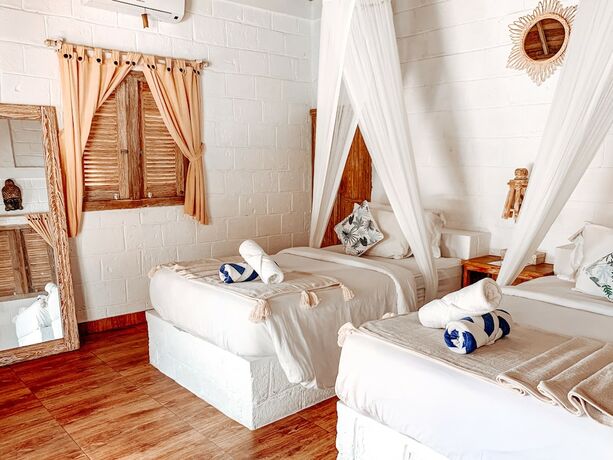 Imagen de la habitación del Hotel Uluwatu Breeze Village. Foto 28