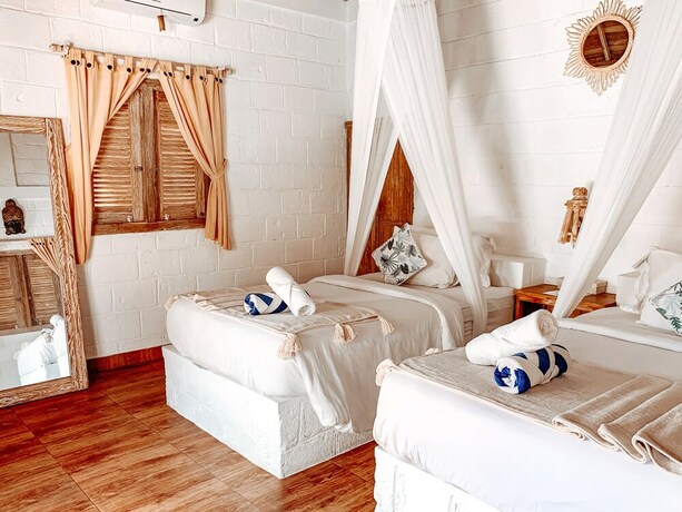 Imagen de la habitación del Hotel Uluwatu Breeze Village. Foto 32