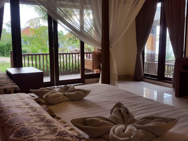 Imagen de la habitación del Hotel Uluwatu Cottages. Foto 15