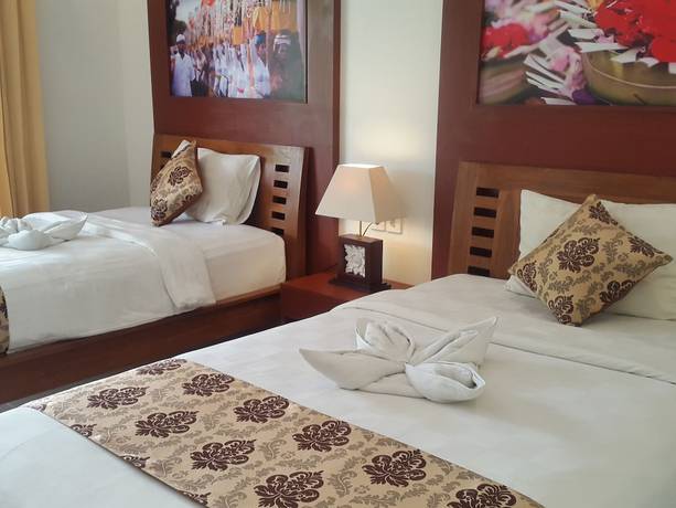 Imagen de la habitación del Hotel Uluwatu Cottages. Foto 16