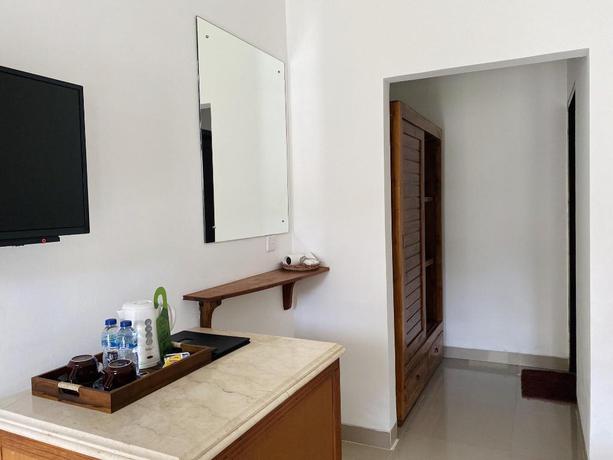 Imagen de la habitación del Hotel Uluwatu Jungle Villa. Foto 8
