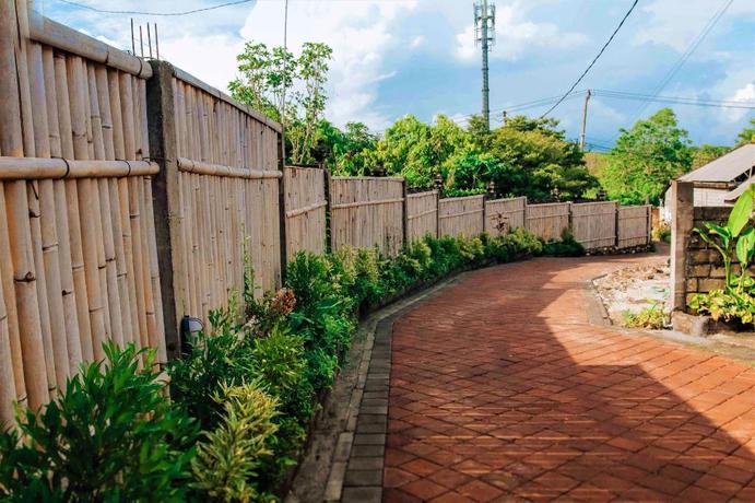 Imagen de la habitación del Hotel Uluwatu Jungle Villa. Foto 11