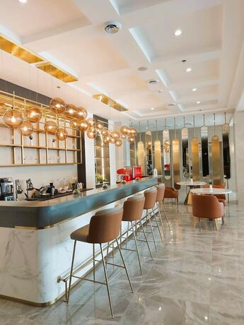 Imagen del bar/restaurante del Hotel Uma And Residences. Foto 8