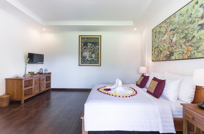 Imagen de la habitación del Hotel Uma Dawa Resort and Spa. Foto 9