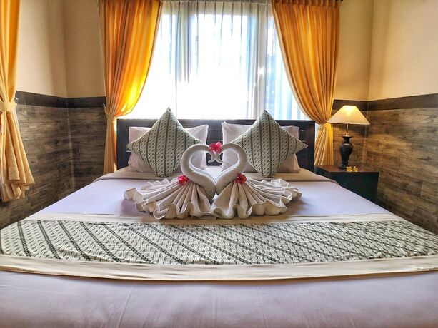 Imagen de la habitación del Hotel Uma Dewi Guest House. Foto 18