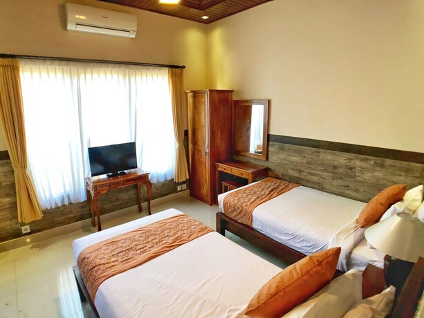 Imagen de la habitación del Hotel Uma Dewi Guest House. Foto 21