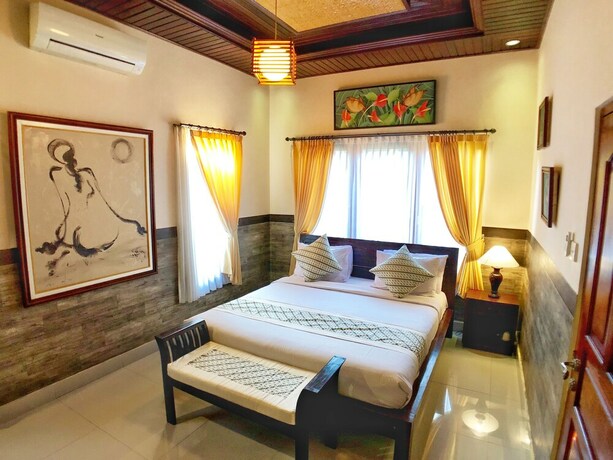 Imagen de la habitación del Hotel Uma Dewi Guest House. Foto 22