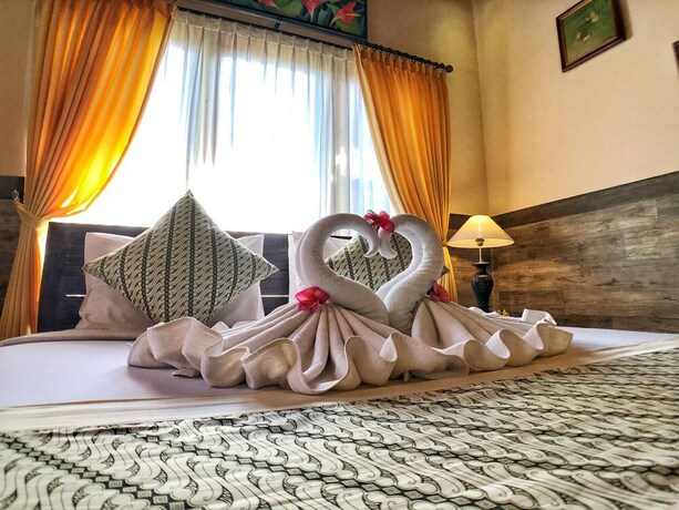 Imagen de la habitación del Hotel Uma Dewi Guest House. Foto 25