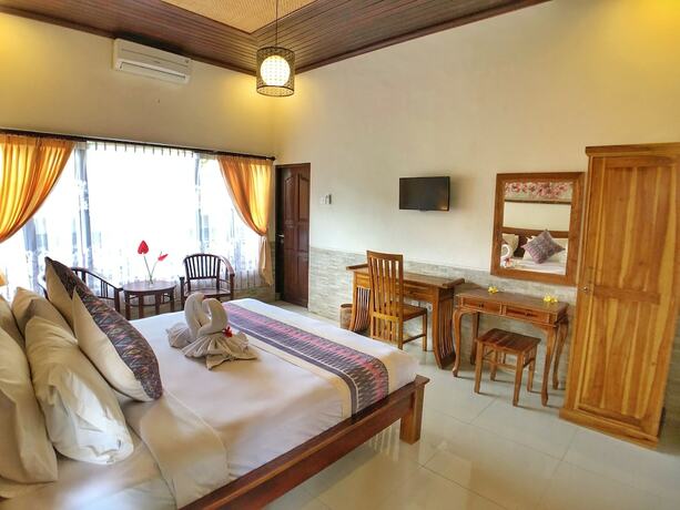 Imagen de la habitación del Hotel Uma Dewi Guest House. Foto 27