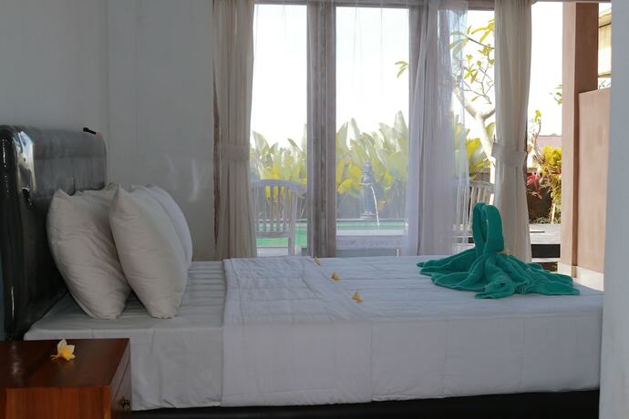 Imagen de la habitación del Hotel Uma Kutuh 2. Foto 4
