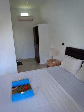 Imagen de la habitación del Hotel Uma Kutuh 2. Foto 10