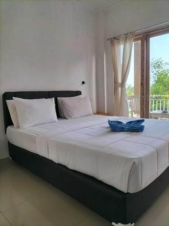 Imagen de la habitación del Hotel Uma Kutuh 2. Foto 15