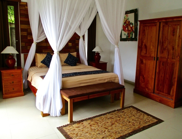 Imagen de la habitación del Hotel Uma Padi Villa. Foto 8