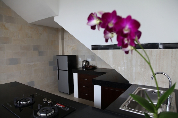 Imagen de la habitación del Hotel Uma Padi Villa. Foto 13