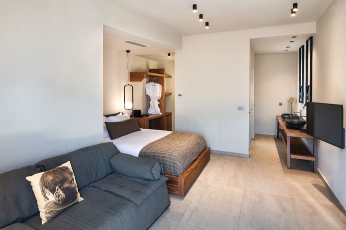 Imagen de la habitación del Hotel Uma Ray Suites. Foto 2