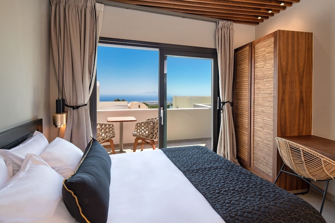 Imagen de la habitación del Hotel Uma Ray Suites. Foto 4