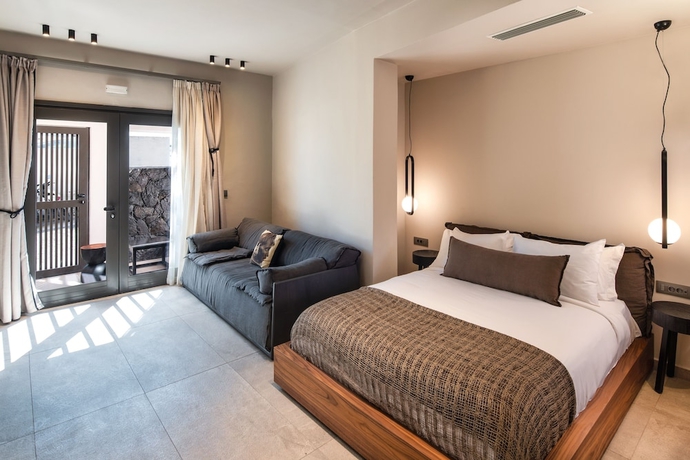 Imagen de la habitación del Hotel Uma Ray Suites. Foto 15
