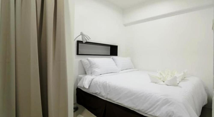 Imagen de la habitación del Hotel Uma Residence. Foto 3