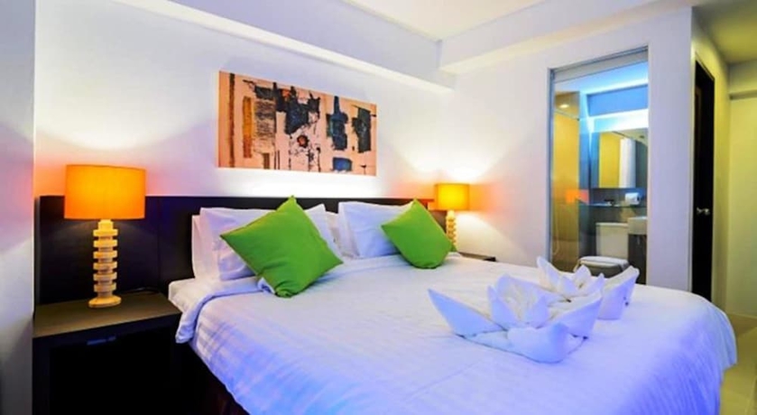 Imagen de la habitación del Hotel Uma Residence. Foto 9