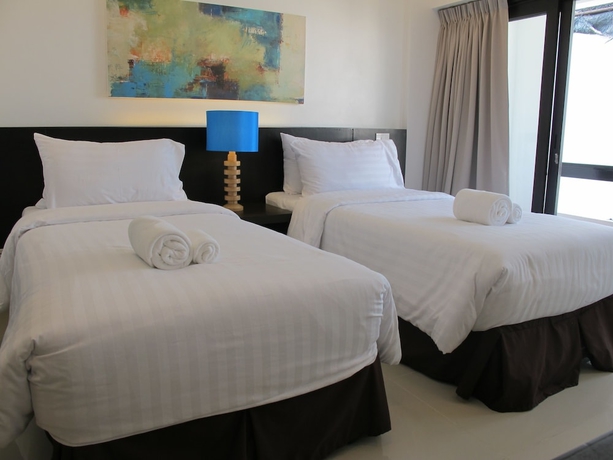 Imagen de la habitación del Hotel Uma Residence. Foto 10