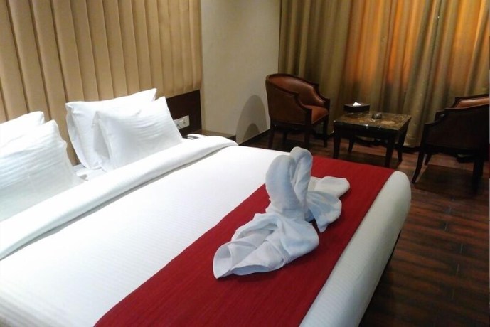 Imagen de la habitación del Hotel Uma Residency. Foto 5