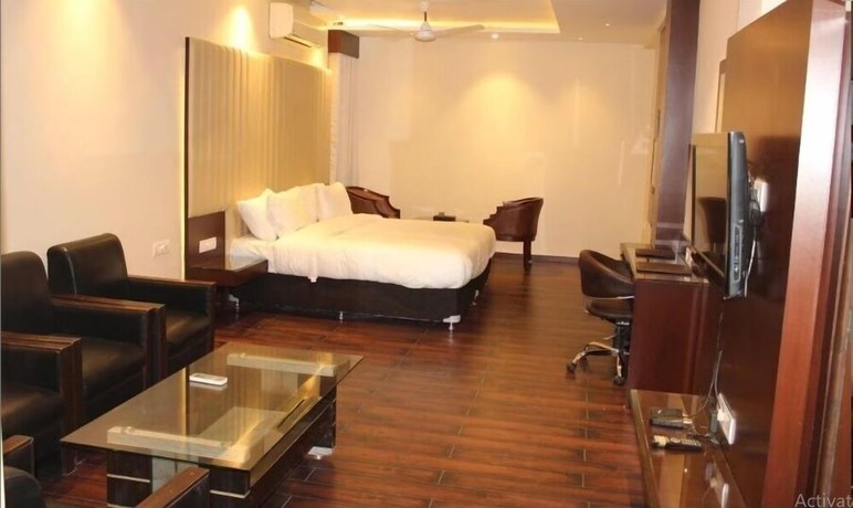 Imagen de la habitación del Hotel Uma Residency. Foto 7