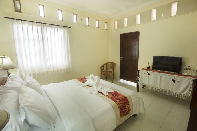Imagen de la habitación del Hotel Uma Sari Ubud. Foto 10