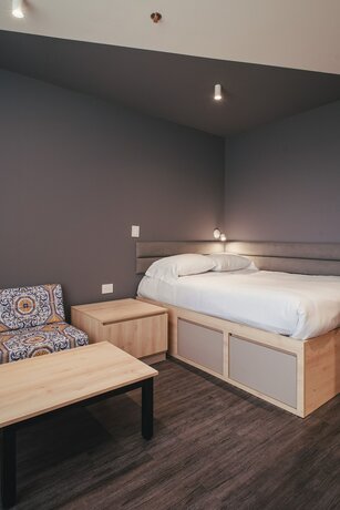 Imagen de la habitación del Hotel Uma Suites Chia. Foto 15