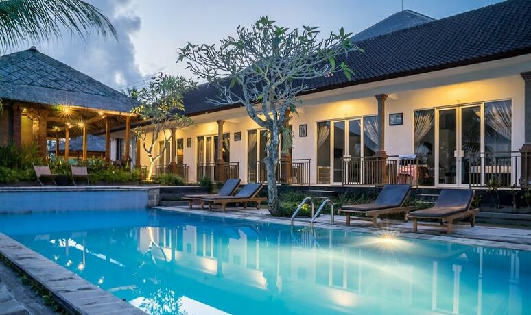 Imagen de la habitación del Hotel Uma Ubud. Foto 19