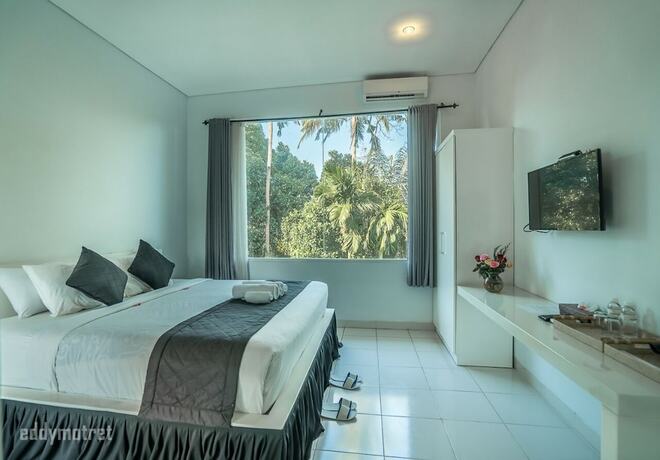 Imagen de la habitación del Hotel Uma Ubud. Foto 20