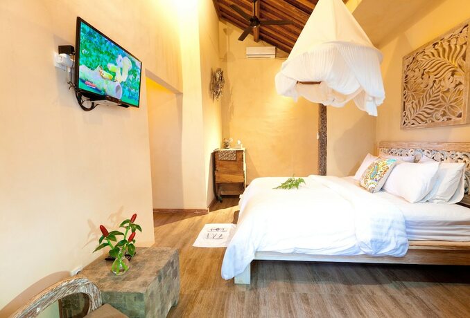 Imagen de la habitación del Hotel Umah Tis Sebatu. Foto 37