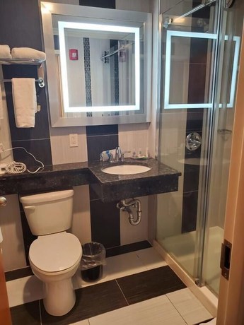 Imagen de la habitación del Hotel Umbrella Brooklyn. Foto 11