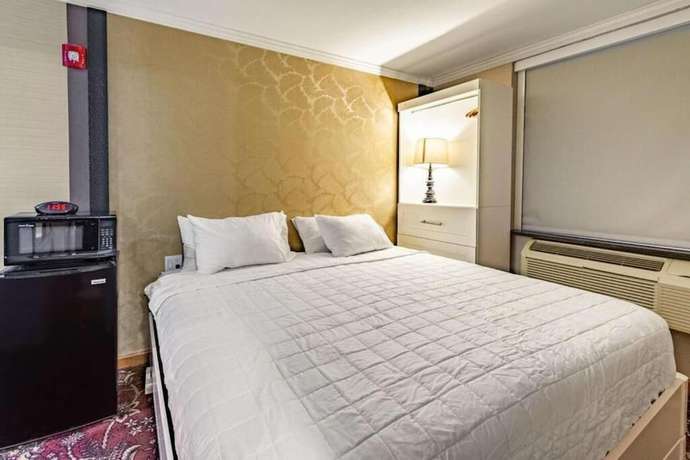 Imagen de la habitación del Hotel Umbrella Brooklyn. Foto 14