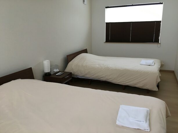 Imagen de la habitación del Hotel Ume House. Foto 19