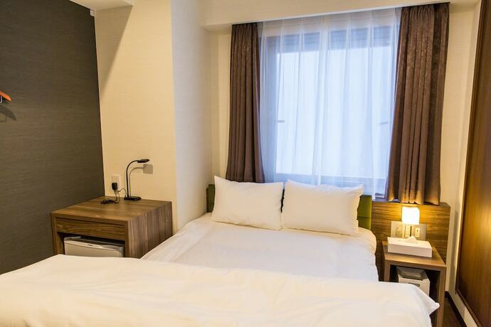 Imagen de la habitación del Hotel Umeda Plaza. Foto 24