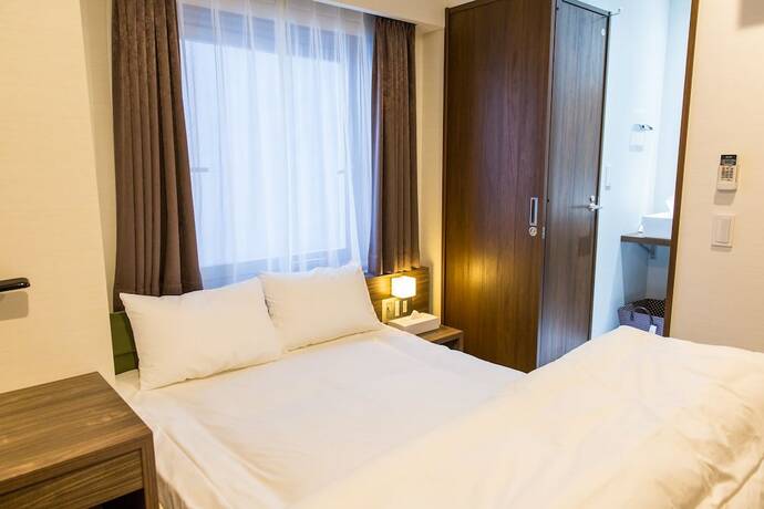 Imagen de la habitación del Hotel Umeda Plaza. Foto 27