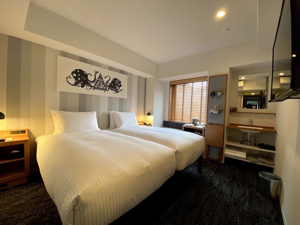 Imagen de la habitación del Hotel Umedaholic. Foto 6