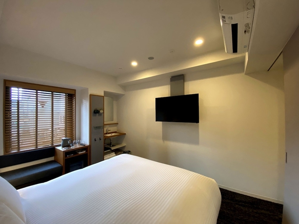 Imagen de la habitación del Hotel Umedaholic. Foto 8