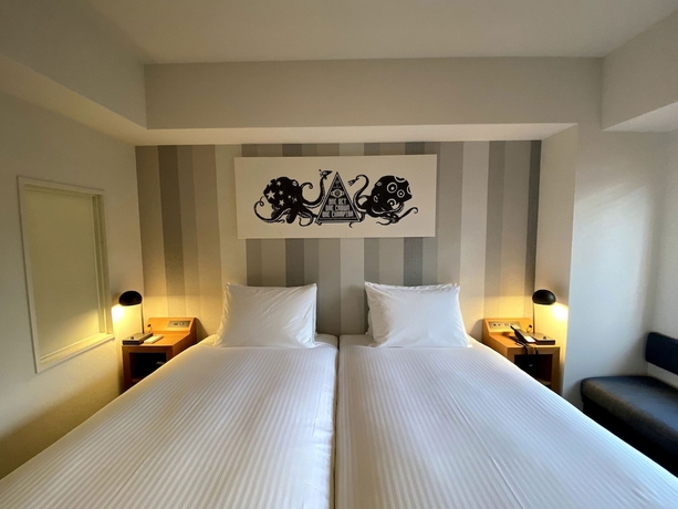 Imagen de la habitación del Hotel Umedaholic. Foto 9