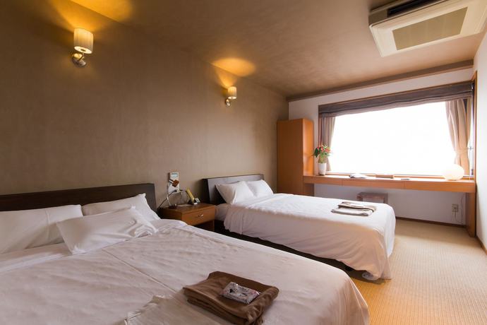 Imagen de la habitación del Hotel Umine. Foto 18