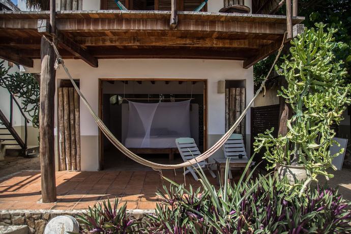 Imagen de la habitación del Hotel Un Sue&ntilde;o Caba&ntilde;as del Pac&iacute;fico. Foto 9