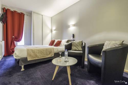 Imagen de la habitación del Hotel Un Sur Le Port. Foto 5