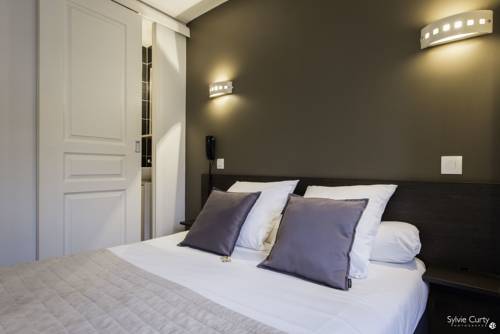 Imagen de la habitación del Hotel Un Sur Le Port. Foto 6