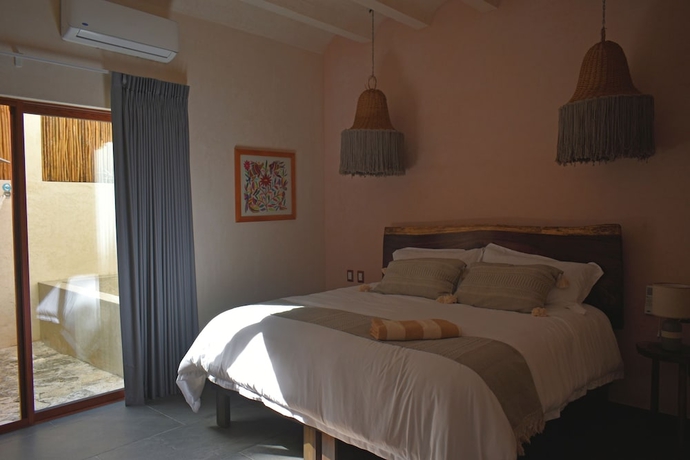 Imagen de la habitación del Hotel Unahana Boutique and villas. Foto 4