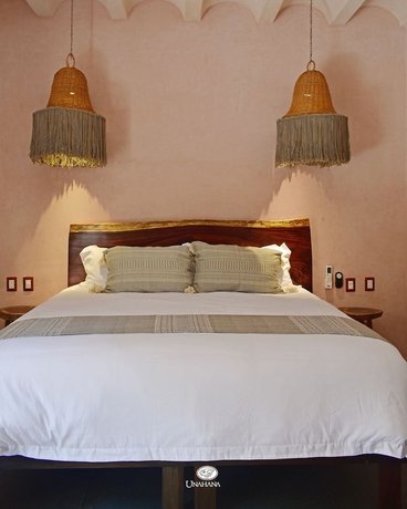 Imagen de la habitación del Hotel Unahana Boutique and villas. Foto 8