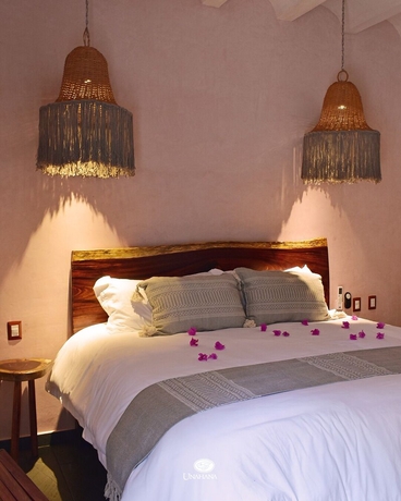 Imagen de la habitación del Hotel Unahana Boutique and villas. Foto 9